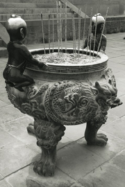 Large incense burner in a temple courtyard