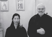 Rebecca li with Simon Child, both in robes for Rebecca's transmission ceremony