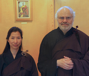 Rebecca Li with Simon Child, both in robes